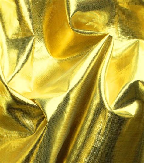 shiny metallic fabric|white fabric with gold metallic.